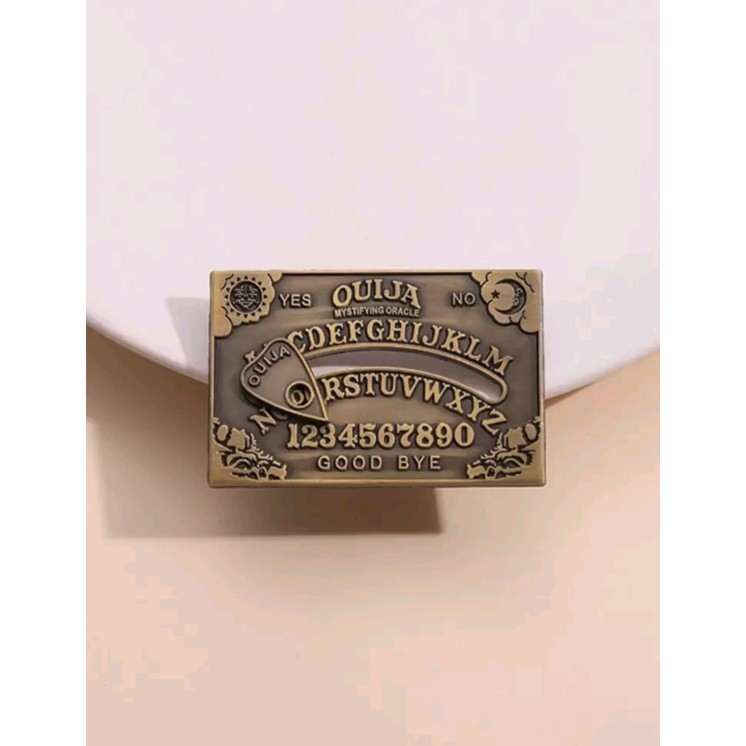 Pin estilo Ouija con diseño de sol y luna